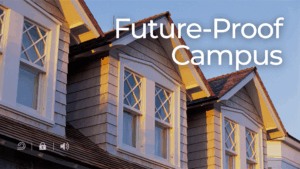 Front view of a residential-style building at sunset with white-trimmed windows and brown shingles, accompanied by the bold white text “Future-Proof Campus” in the sky area above the roofline.