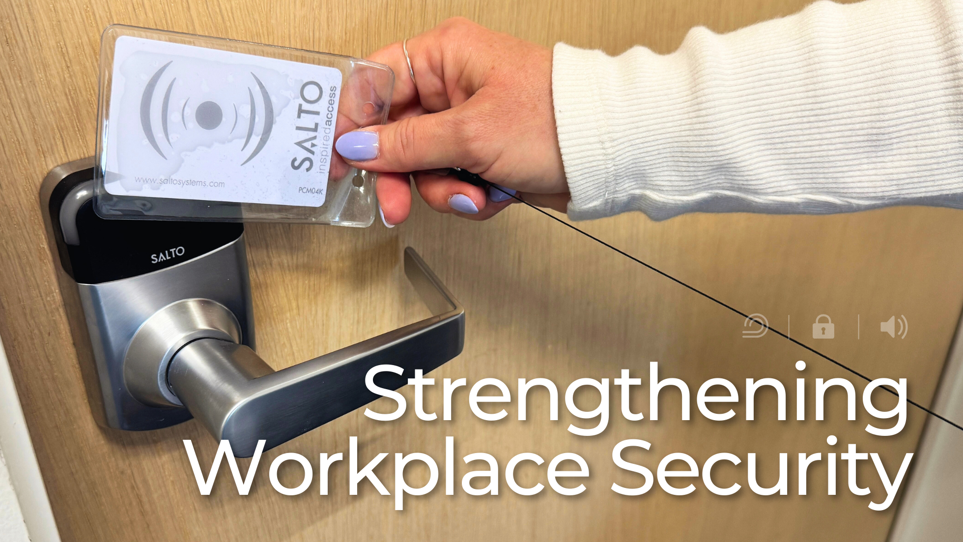 A close-up of a person using a SALTO access control card to unlock a secured door with a smart lock. The person is wearing a white sweater and has light purple nail polish. The overlay text reads "Strengthening Workplace Security," emphasizing the importance of secure access systems in professional environments.